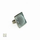 Op-art fekete alapú kör gyűrű