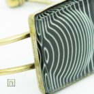 Op-art fekete alapú kör karkötő