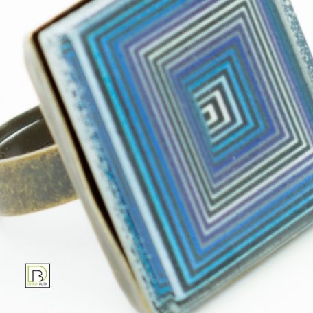 Op-art kék négyzetek gyűrű
